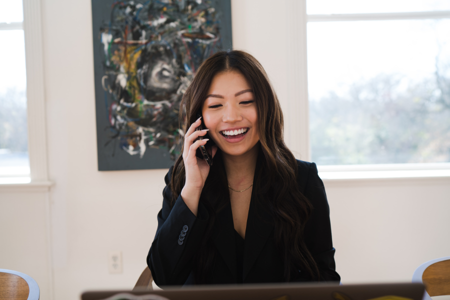 Happy woman talking on phone