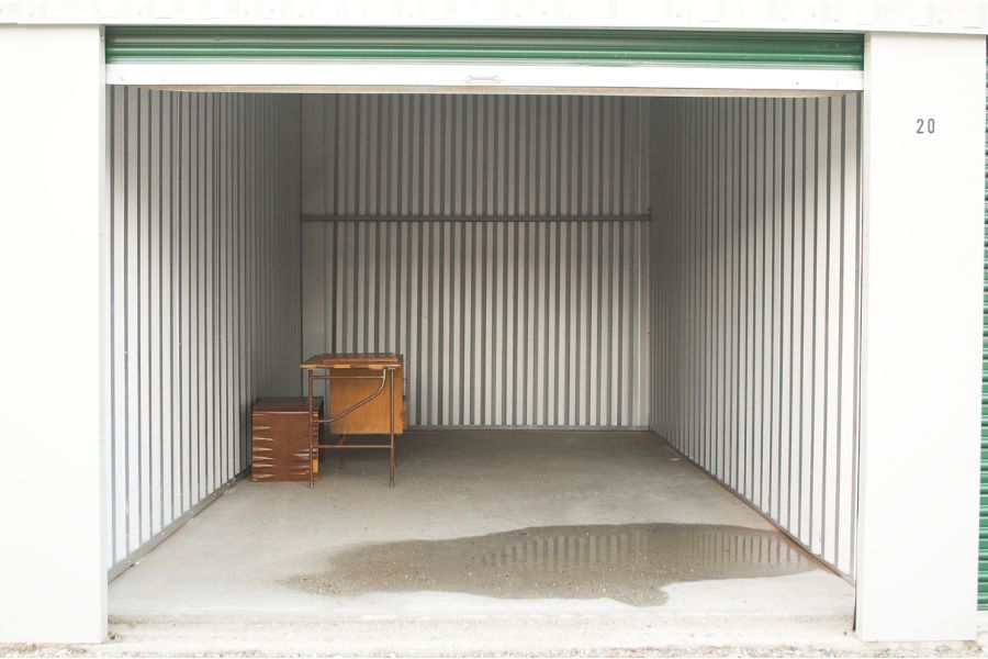 empty storage unit with small table