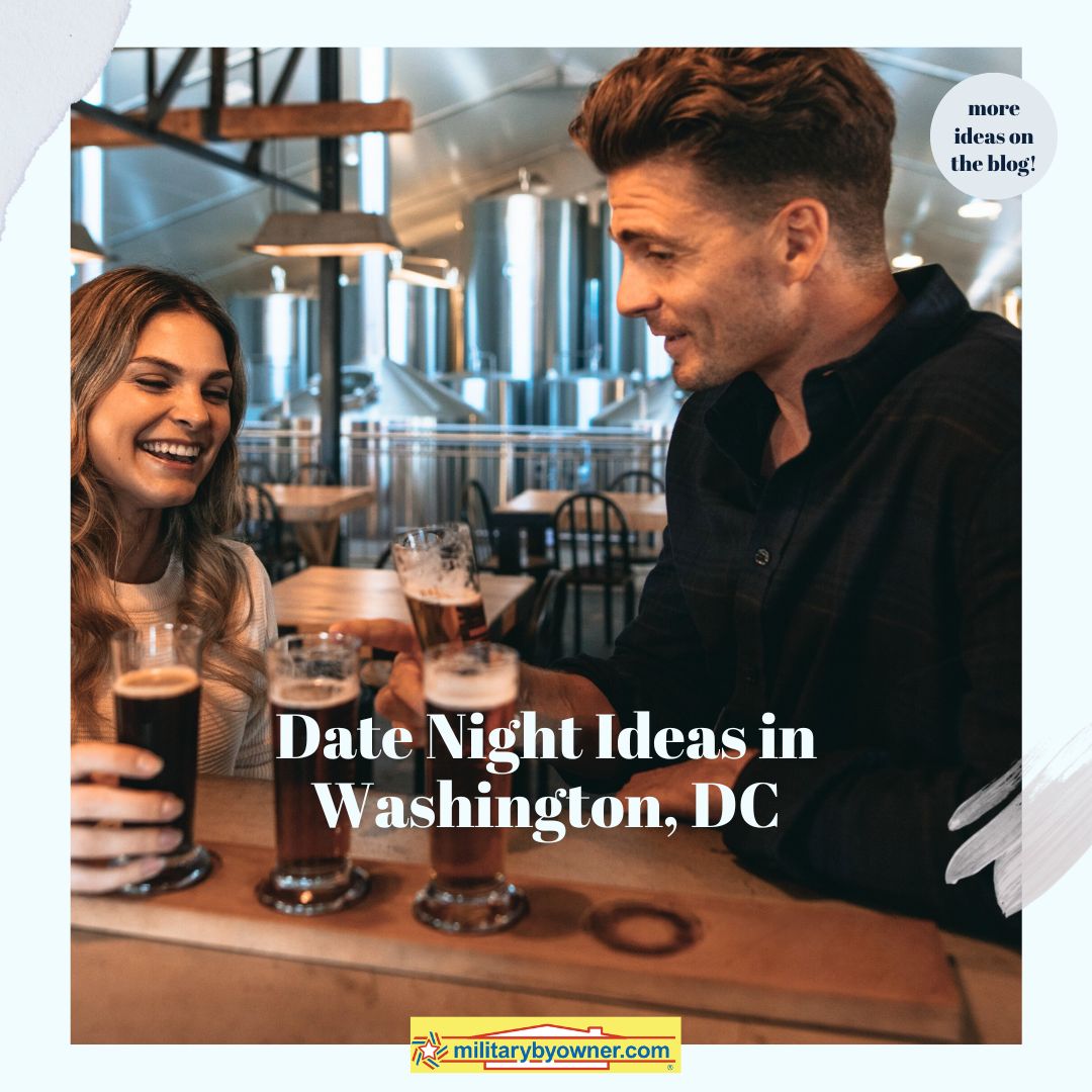 man wearing a black shirt with woman shitting at restaurant 
