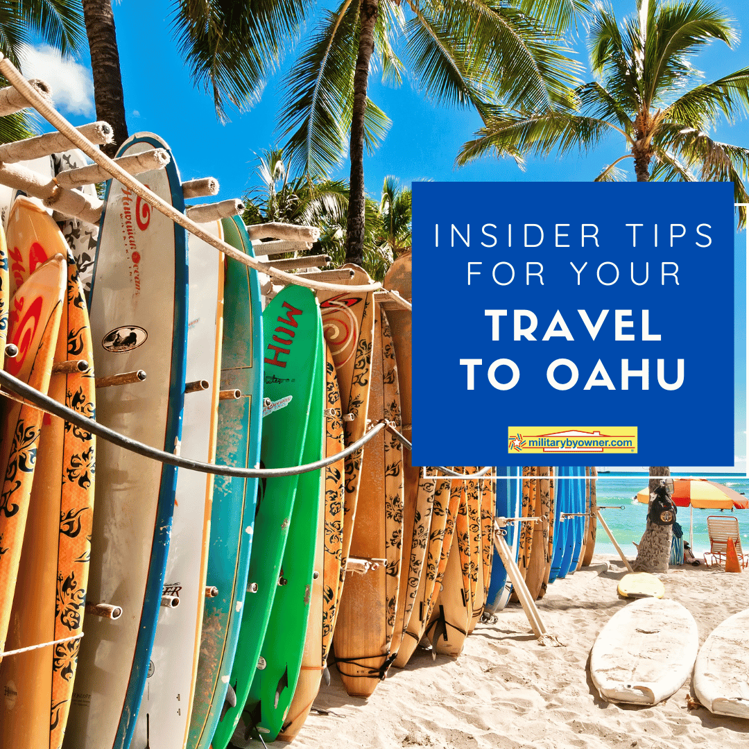 surfboards stacked palm trees in the background linked to Insider_Tips_for_Your_Travel_to_Oahu