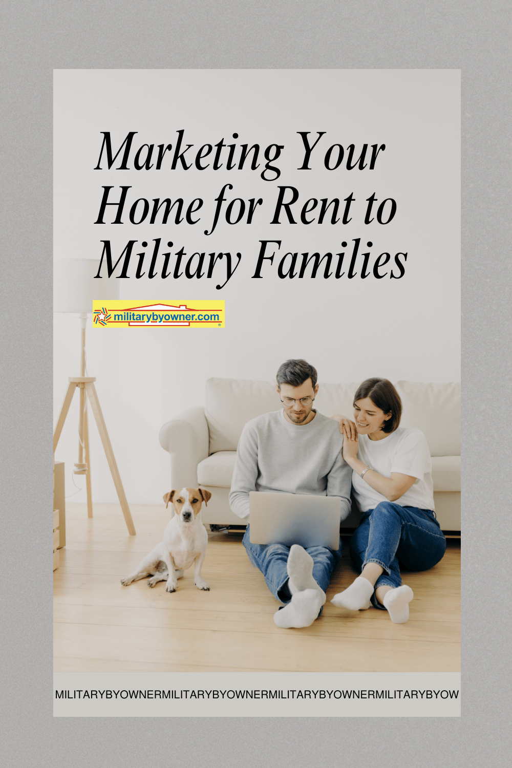 Couple in jeans sit next to dog on wooden floor in front of couch looking at laptop. 