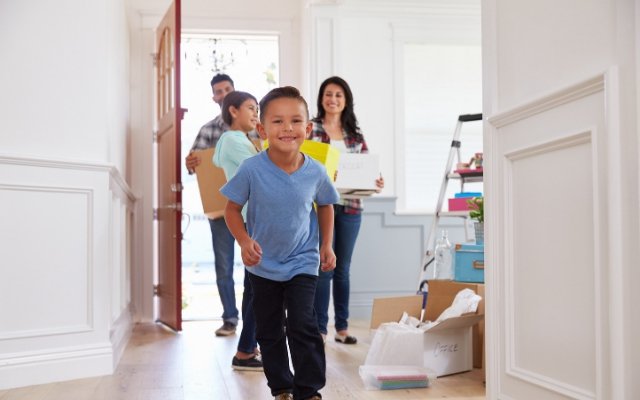 family moving into new rental home